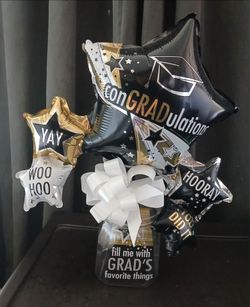 Graduation ballons with clear container to fill with favorite things