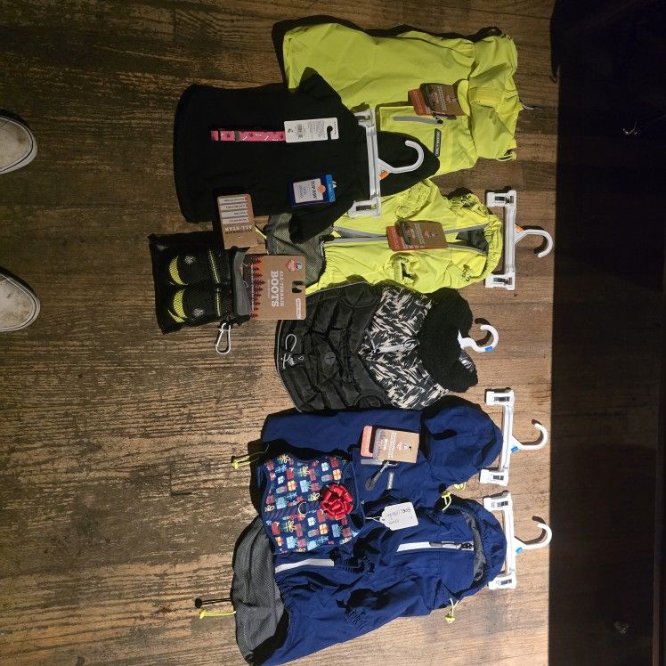 ALL BRAND NEW WITH TAGS ATTACHED SMALL DOGGIE/ CAT CLOTHES FOR COLD WEATHER AND RAIN