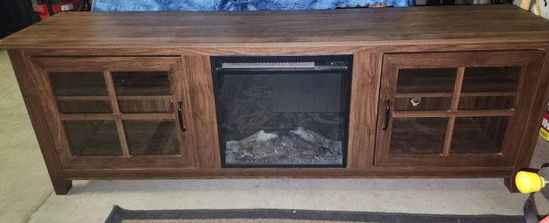 Entertainment center with fireplace