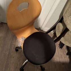 Wooden Rolling Chair With Black Cushion 