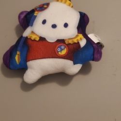 The product is a McDonald's toy featuring a Yu-Gi-Oh x Hello Kitty collaboration in the year 2024. Included is a small animal clip-on coin Purse