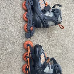 Roller Blades (Adjustable Size 1-4 Kid Size) 