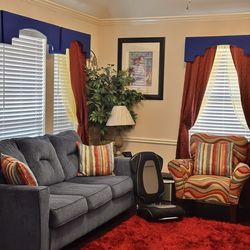 blue couch sleeper  and chair and matching pillows  for $350