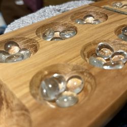 Wooden Mancala Board with clear marbles