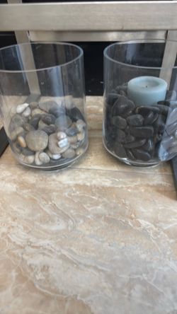 Three glass “hurricane lamp” vase