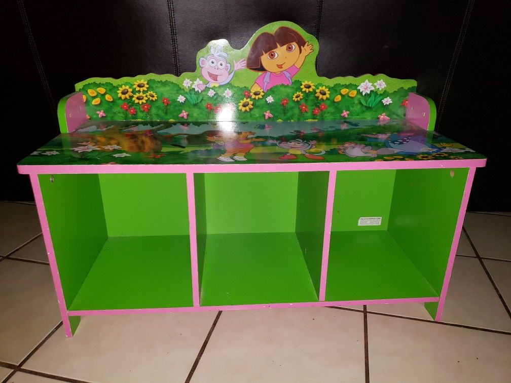 Adorable Dora the Explorer bookshelf/reading bench/shoe storage and free Giant Dora stuffed animal