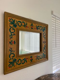 Beautiful hand-painted wooden wall mirror