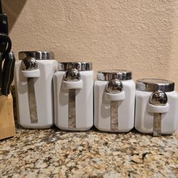 4 White Canisters With Spoons