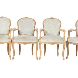 A Set Of Four Louis XV-Style Dining Chairs