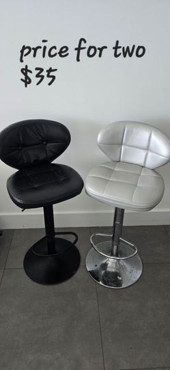 Two bar stools,  black and silver
