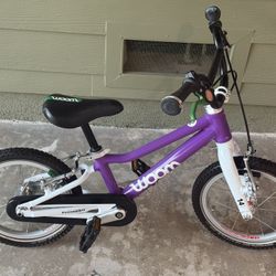 Woom 2 kids 14 inch light weight bicycle in great shape