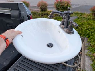 American Standard bathroom sink and Delta faucet