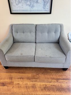 Gray love seat