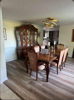 Elegant Formal Dining Set with Matching China Hutch – Statement Piece