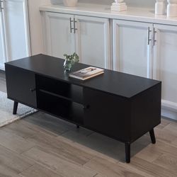 Small-Low Profile Black TV Media Console. Used, in good condition. 

53.5" W x 16"D x 19.5"H 

Decor Not Included 

$95

TV Stand 