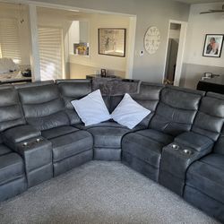 Medium Size Gray Sectional With Full Recliners