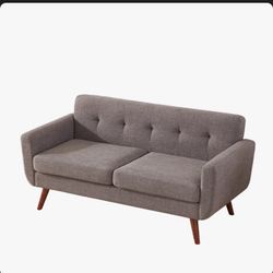 Grey Two Seater Couch That Was Only For Staging A Property 