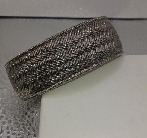 Silver plated woven look hinged bracelet
