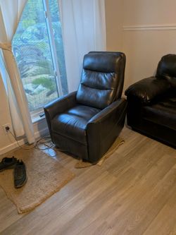Nice leather recliner    it reclines back