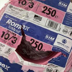 250 ft. 10/3 Solid Romex SIMpull CU NM-B with G Wire Pink Coil