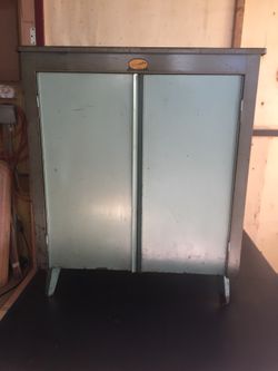 Antique cabinet industrial 27w x18d x32 h.