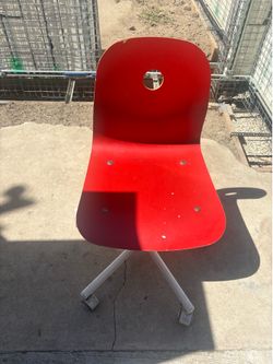 Red spinning chair