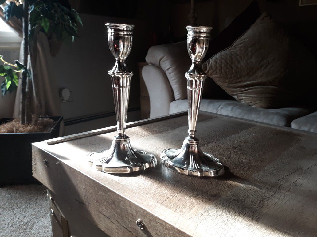BRAND NEW SILVER CANDLE HOLDERS