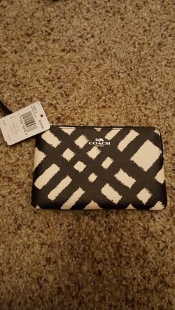 Coach black and white wristlet
