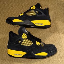 black and yellow jordan 4s 