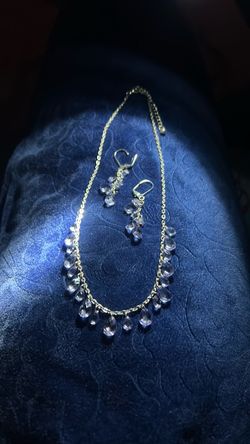 lavender jeweled  necklace, and earrings