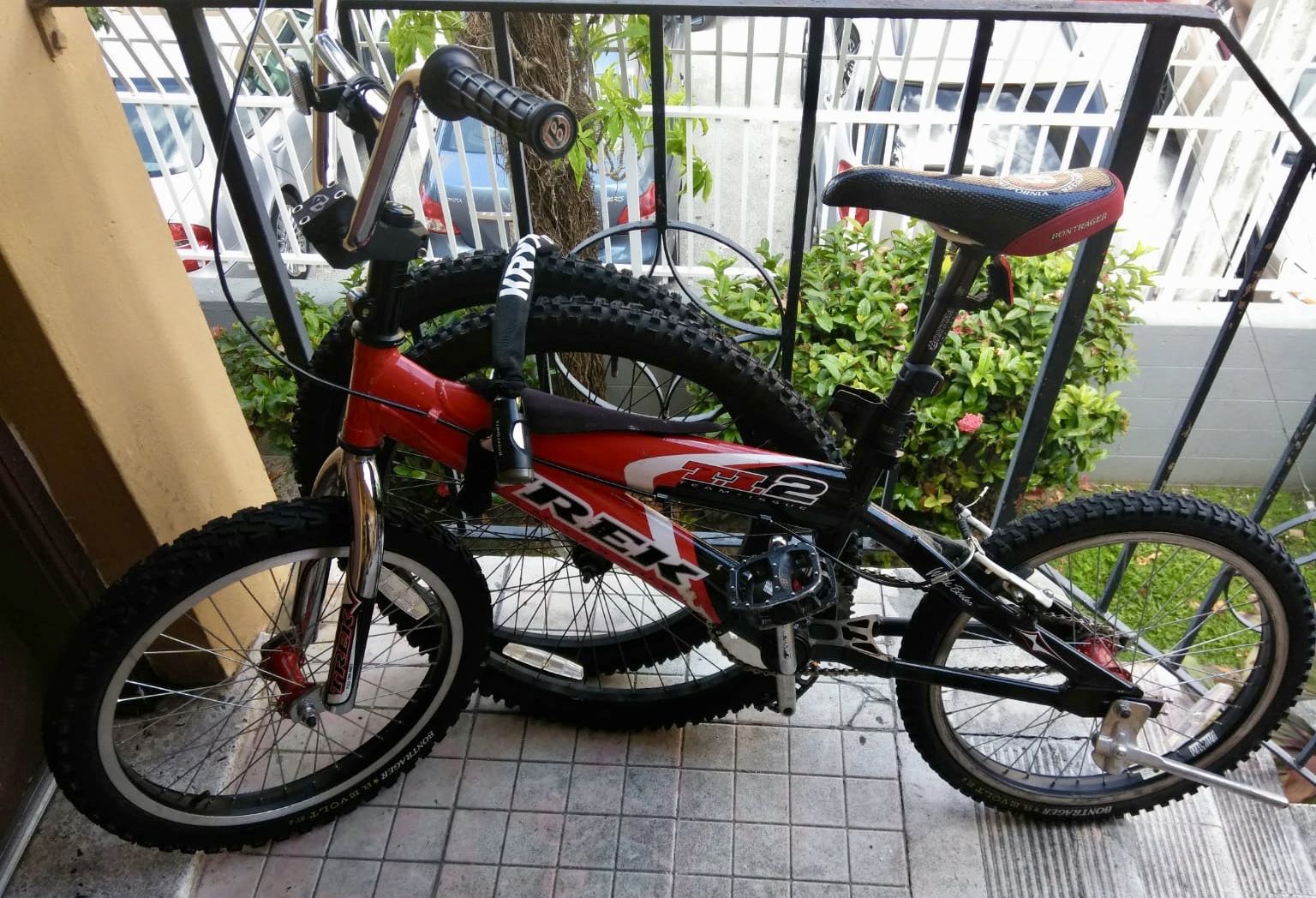 Trek TI2 BMX bicycle and two 24’ wheels.