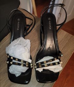 Black studded heals (10)