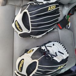 (2)  Wilson A500 LHT 12" youth baseball gloves. 