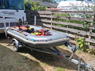 INFLATABLE AVON 3.1 with 18hp Tohatsu and EZ Loader Galvanized Trailer plus electric motor