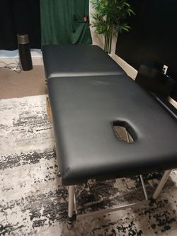 Massage table