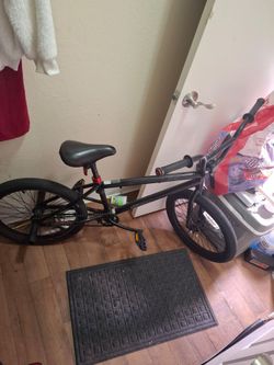 Black BMX Bike with Red Accents