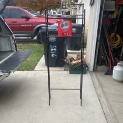 Behind Toilet Shelves 