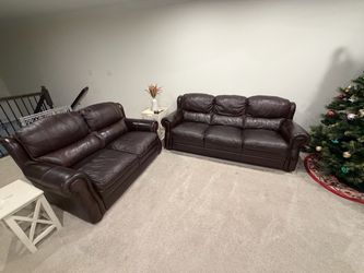 Genuine leather sofa and loveseat set, originally purchased from Mealey’s Furniture