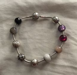 Pandora Essence bracelet with 10 charms