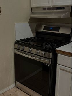 stove , refrigerator, microwave
