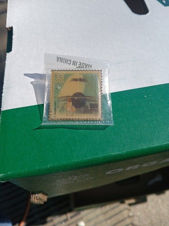 Metal Us Postage Stamp $10 dollars good condiction