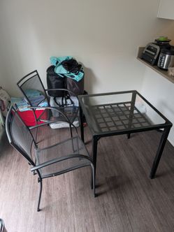 Glass table and 2 chairs