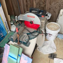 Bosch chop saw with stand.