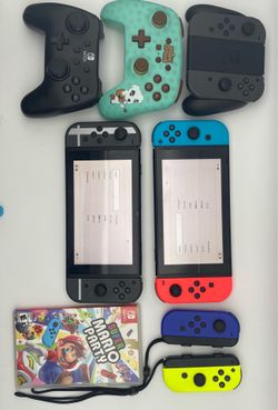 Nintendo Switch Bundle – 2 Consoles + Controllers + Games + Extras