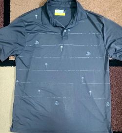 JACK Nicklaus Eco Choice LG Polo Shirt with Palm Trees. Made with recycled plastic bottles
