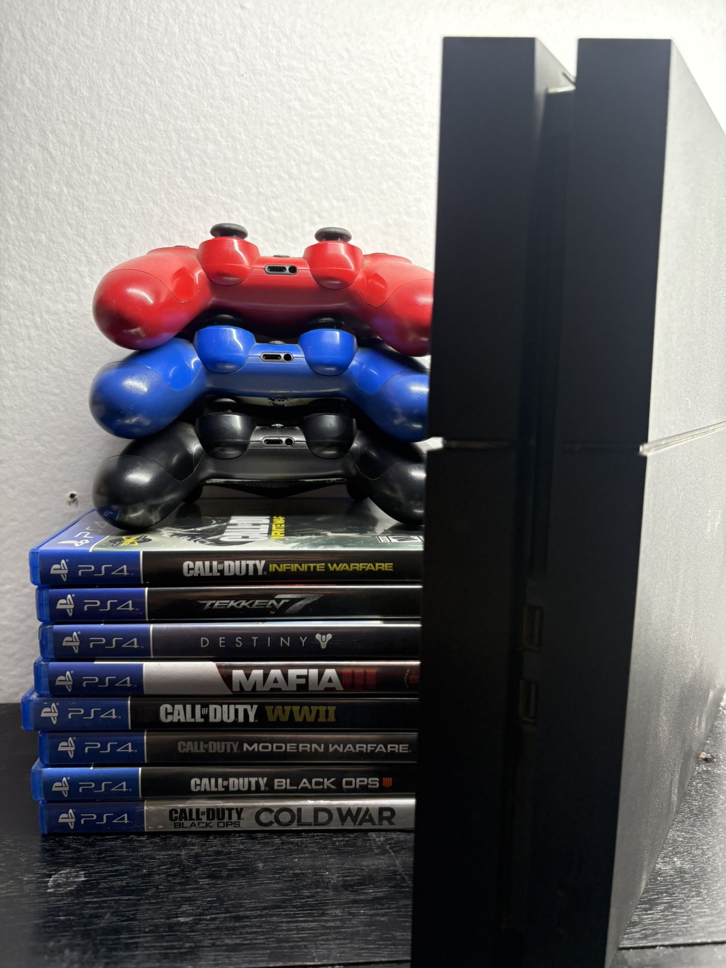 PS4 Slim With 3 Controllers And 8 Games