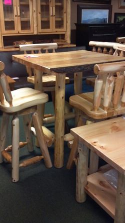 Rustic Log pub table with 4 swivel back bar stools