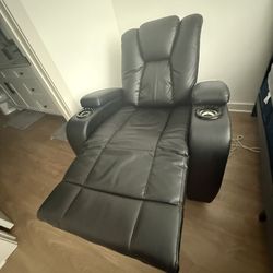 I'm selling a reclining armchair in good condition.