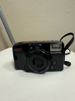 Olympus Infiniti zoom 210