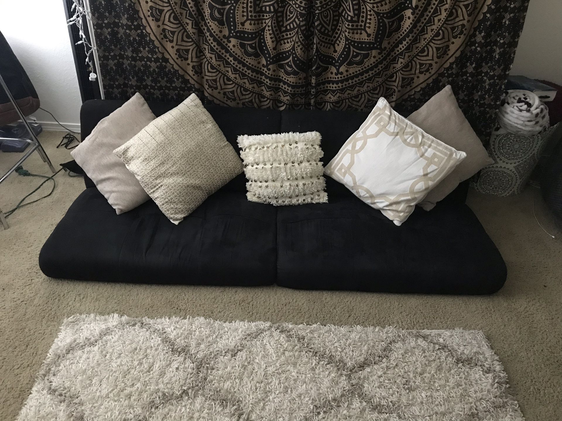 Futon sofa and throw pillows